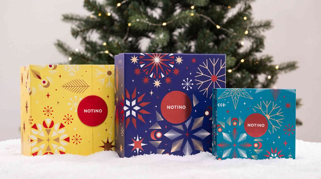 Notino Advent calendars by the Christmas tree